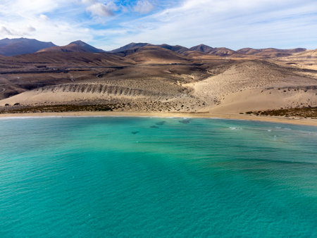 Aerial view on sandy dunes and blue turquoise water of Sotavento beach, Costa Calma, Fuerteventura, Canary islands, Spain in winterの写真素材