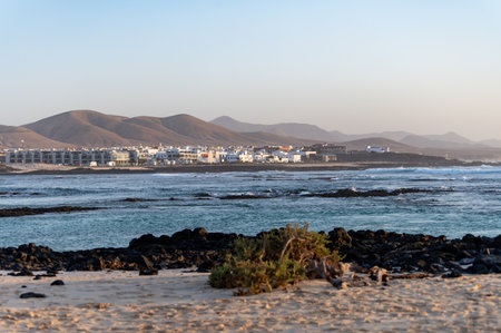 West coast of Fuerteventura island. Winter sea and sun vacation in El Cotillo touristic village, Canary islands, Spain on white sandy beach La Concha.の写真素材