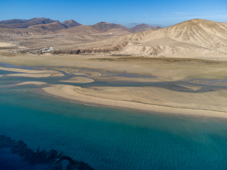 Aerial view on sandy dunes and blue turquoise water of Sotavento beach, Costa Calma, Fuerteventura, Canary islands, Spain in winterの写真素材