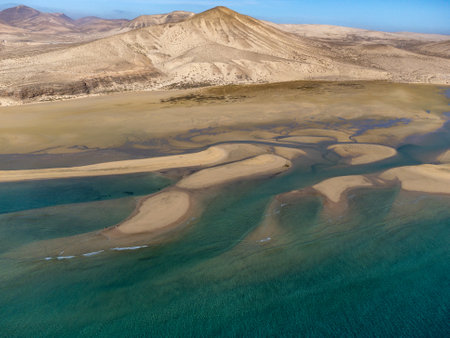 Aerial view on sandy dunes and blue turquoise water of Sotavento beach, Costa Calma, Fuerteventura, Canary islands, Spain in winterの写真素材