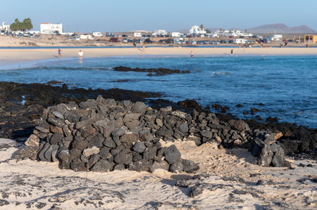 West coast of Fuerteventura island. Winter sea and sun vacation in El Cotillo touristic village, Canary islands, Spain on white sandy beach La Concha.の写真素材