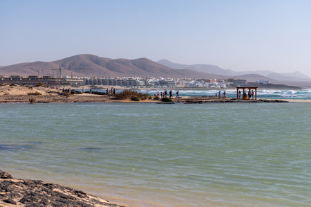 West coast of Fuerteventura island. Winter sea and sun vacation in El Cotillo touristic village, Canary islands, Spain on white sandy beach La Concha.のeditorial素材