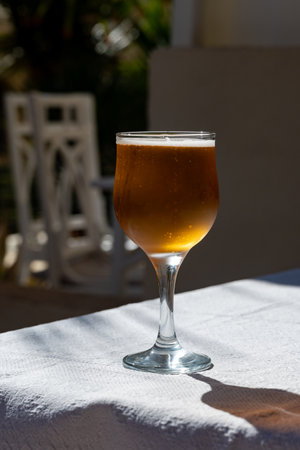 Lunch with cold beer in Spanish outdoor cafe, sunny dayの写真素材