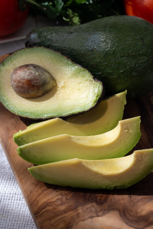 Ripe green organic avocados ready to eat, on table, Fuerteventura, Canary islands, Spainの写真素材