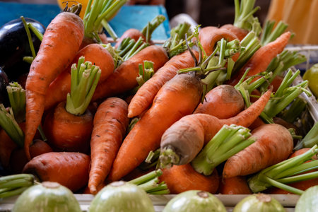 Fresh sweet organic orange carrots roots on farmers market on Tenerife, Canary islands, Spain, close upの写真素材
