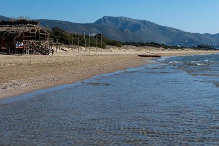 Sandy beach near medieval small touristic coastal town Sperlonga and sea shore, Latina, Italy in winterの写真素材