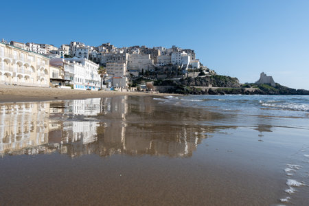 View on sandy beach and sea water in medieval small touristic coastal town Sperlonga and sea shore, Latina, Italy in winterの写真素材