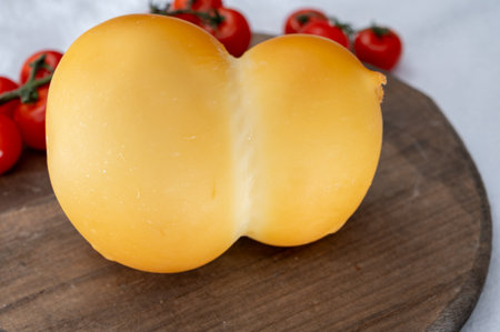 Cheese collection, Italian cheese scamorza, caciocavallo, provolone made from cow milk in South...