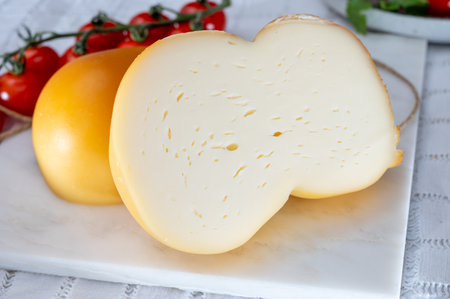 Cheese collection, Italian cheese scamorza, caciocavallo, provolone made from cow milk in South...