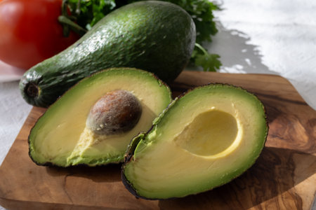 Ripe green organic avocados ready to eat, on table, Fuerteventura, Canary islands, Spainの写真素材