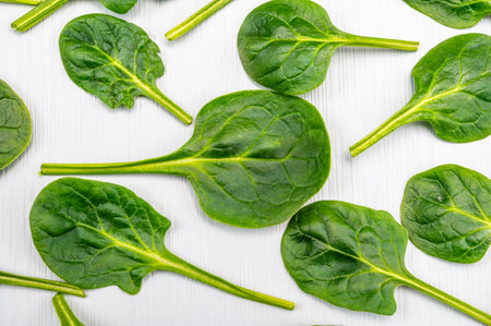 Fresh green baby Spinach leaves, diet and healthy food concept, weight loss, spinach background top viewの写真素材