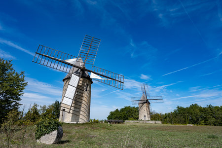 View on old grain mills near medieval town St. Emilion, production of red Bordeaux wine on cru class vineyards in Saint-Emilion wine making region, France, Bordeauxの写真素材