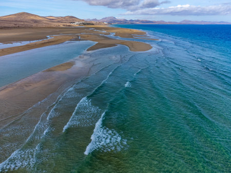 Aerial view on sandy dunes and blue turquoise water of Sotavento beach, Costa Calma, Fuerteventura, Canary islands, Spain in winterの写真素材