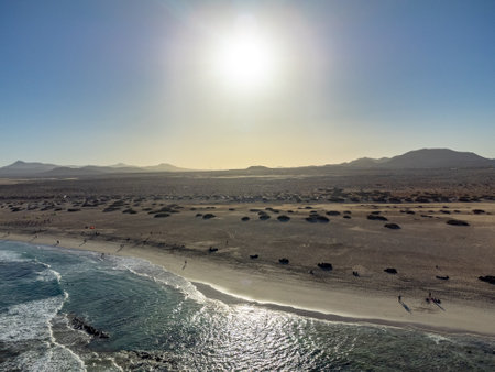 Aerial view Corralejo dunes, white sandy beach, blue water, Lobos and Lanzarote islands, north of Fuerteventura, Canary islands, Spainの写真素材