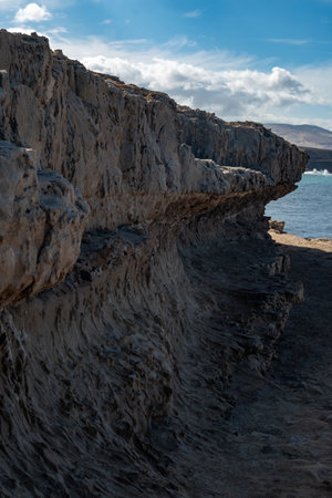 Oldest rocks of Canary Islands in cave network in town of Ajuy, north of Pajara, geological wonder consists of sedimentary substrates formed in deep ocean, Cretaceous periodの写真素材