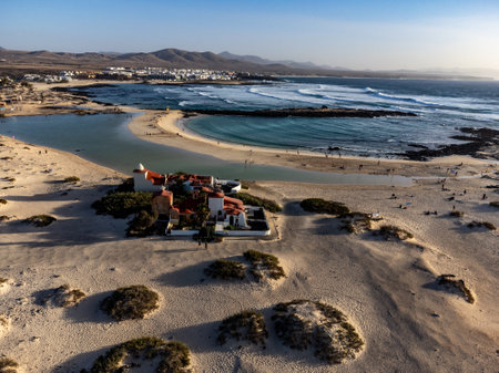 West coast of Fuerteventura island. Winter sea and sun vacation in El Cotillo touristic village, Canary islands, Spain on white sandy beach La Concha.の写真素材