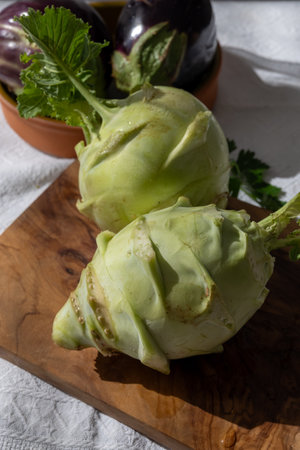 Heads of fresh ripe bio white small cabbage kohlrabi from organic farm, close upの写真素材