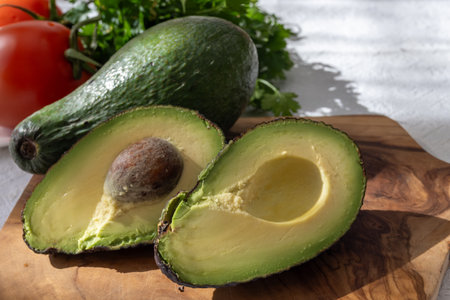 Ripe green organic avocados ready to eat, on table, Fuerteventura, Canary islands, Spainの写真素材