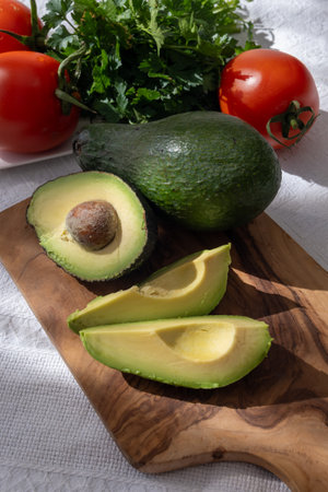 Ripe green organic avocados ready to eat, on table, Fuerteventura, Canary islands, Spainの写真素材