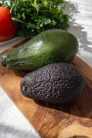 Ripe green organic avocados ready to eat, on table, Fuerteventura, Canary islands, Spainの写真素材