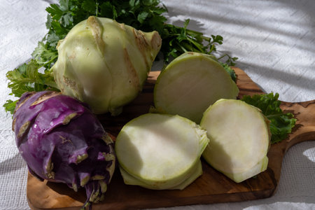 Heads of fresh ripe bio white and purple small cabbage kohlrabi from organic farm, close upの写真素材