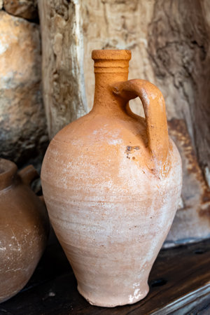 Old terracotta clay kitchenware jars, jugs and pots, ancient cookwareの写真素材