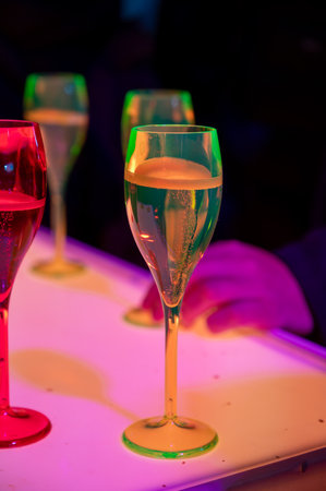Visitors drinking of sparkling wine champagne on outdoor winter festival in December on Avenue de Champagne, Epernay, Champagne region, Franceの写真素材