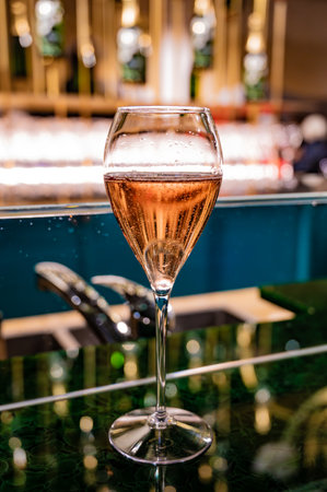 Glass with little bubbles, tasting of sparkling wine champagne on winter festival in December, Avenue de Champagne, Epernay, Champagne region, Franceの写真素材