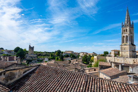 Views of old houses and narrow hilly streets of medieval town St. Emilion, production of red Bordeaux wine on cru class vineyards in Saint-Emilion wine making region, France, Bordeauxの写真素材
