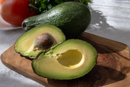 Ripe green organic avocados ready to eat, on table, Fuerteventura, Canary islands, Spainの写真素材