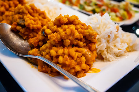 Side dishes, vegetarian mezze in Turkish restaurant, bulgur pilaf and riceの写真素材