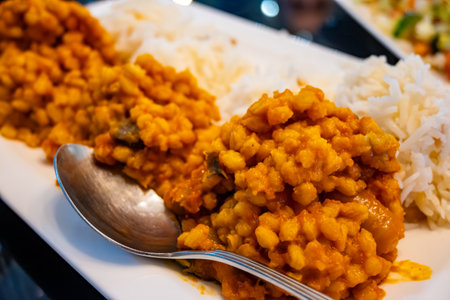 Side dishes, vegetarian mezze in Turkish restaurant, bulgur pilaf and riceの写真素材