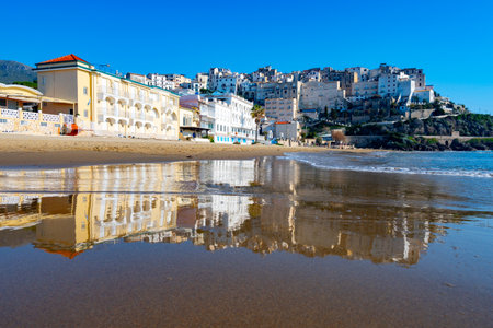 View on sandy beach and sea water in medieval small touristic coastal town Sperlonga and sea shore, Latina, Italy in winterの写真素材