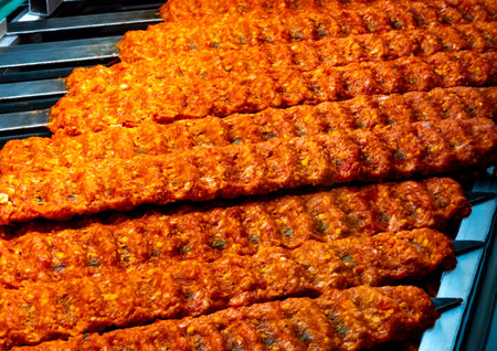 Turkish mixed grill meat, chicken wings, lamb, beef shashlik, kebab cooking on charcoal grill in restaurant in Istanbulの写真素材