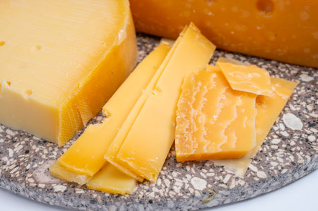 Cheese collection, Dutch very old 1000 days ripe hard cheeses made from cow milk in the Netherlands close upの写真素材