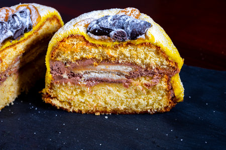 Polenta e Osei di Bergamo Alta most renowned sweet specialty of Bergamo's cuisine, made from sponge cake, chocolate, butter, hazelnut creams and rumの写真素材