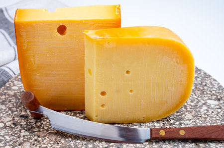 Cheese collection, Dutch ripe hard cheeses made from cow milk in the Netherlands close upの写真素材