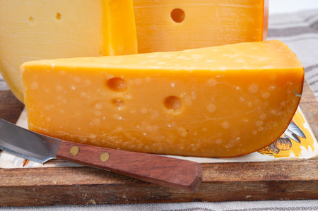 Cheese collection, Dutch ripe hard cheeses made from cow milk in the Netherlands close upの写真素材