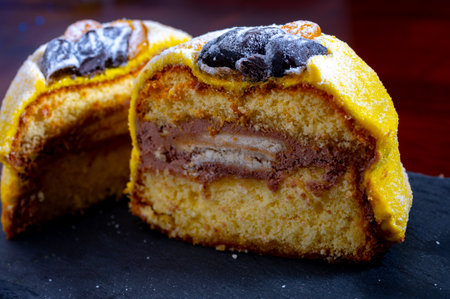 Polenta e Osei di Bergamo Alta most renowned sweet specialty of Bergamo's cuisine, made from sponge cake, chocolate, butter, hazelnut creams and rumの写真素材