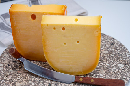 Cheese collection, Dutch ripe hard cheeses made from cow milk in the Netherlands close upの写真素材