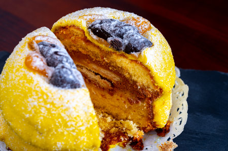 Polenta e Osei di Bergamo Alta most renowned sweet specialty of Bergamo's cuisine, made from sponge cake, chocolate, butter, hazelnut creams and rumの写真素材