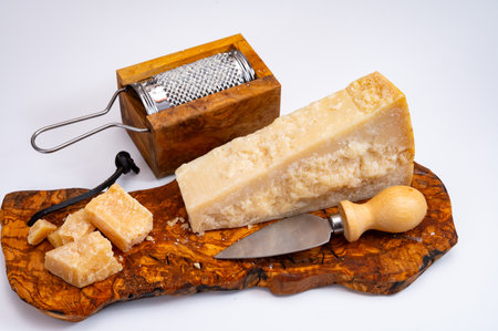Traditional italian food - 24 months aged in caves Italian parmesan hard cheese from Parmigiano-Reggiano, Italyの写真素材