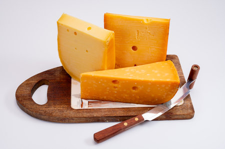 Cheese collection, Dutch ripe hard cheeses made from cow milk in the Netherlands close upの写真素材