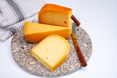 Cheese collection, Dutch ripe hard cheeses made from cow milk in the Netherlands close upの写真素材