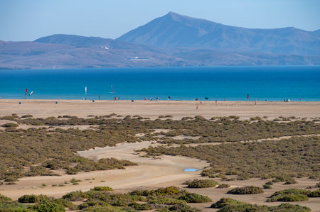 Sandy dunes and blue turquoise water of Sotavento beach, Costa Calma, Fuerteventura, Canary islands, Spain in winterの写真素材