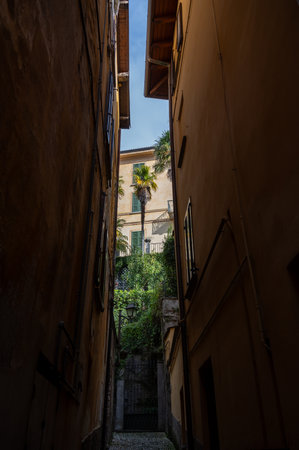 Tourist destination small medieval village of Bellagio with hilly narrow streets and luxurious villas, holiday destination on Lake Como, Italy in springの写真素材