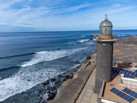 Punta de Jandia and lighthouse on southern end of Fuerteventura island, accessible only by gravel road, sunny winter dayの写真素材