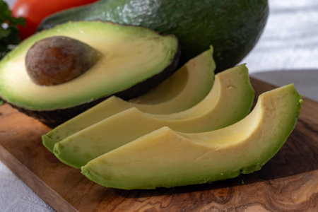 Ripe green organic avocados ready to eat, on table, Fuerteventura, Canary islands, Spainの写真素材