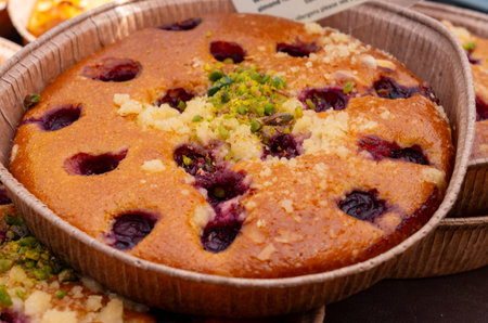 Sweet pastries, organic rustic apple cakes, cherry, almond cakes on food market in London, UKの写真素材