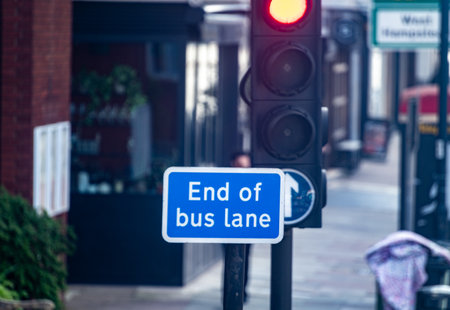 Transportation in London city, roads, road signes, street signs, different warnings, indicating of directions in Great Britain, city life in Englandの写真素材